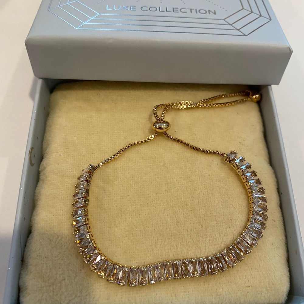 Eye Candy Los Angeles Gold bolo tennis style Bracelet clear baguette stones